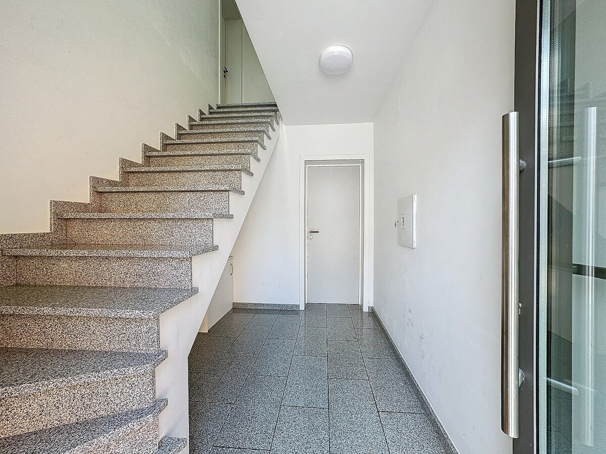 Recent (2017) gelijkvloers appartement met grote tuin te Ophasselt 