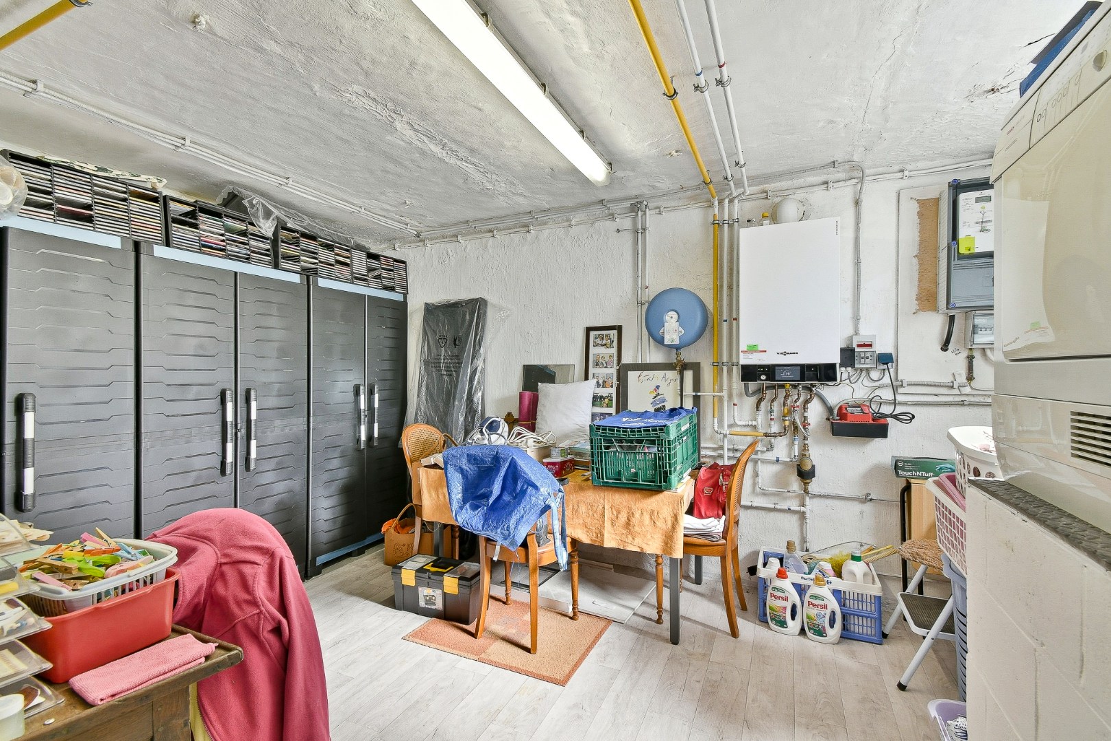 Instapklaar gelijkvloers appartement met privatieve toegang, garage, zonnige tuin en terras nabij zee 