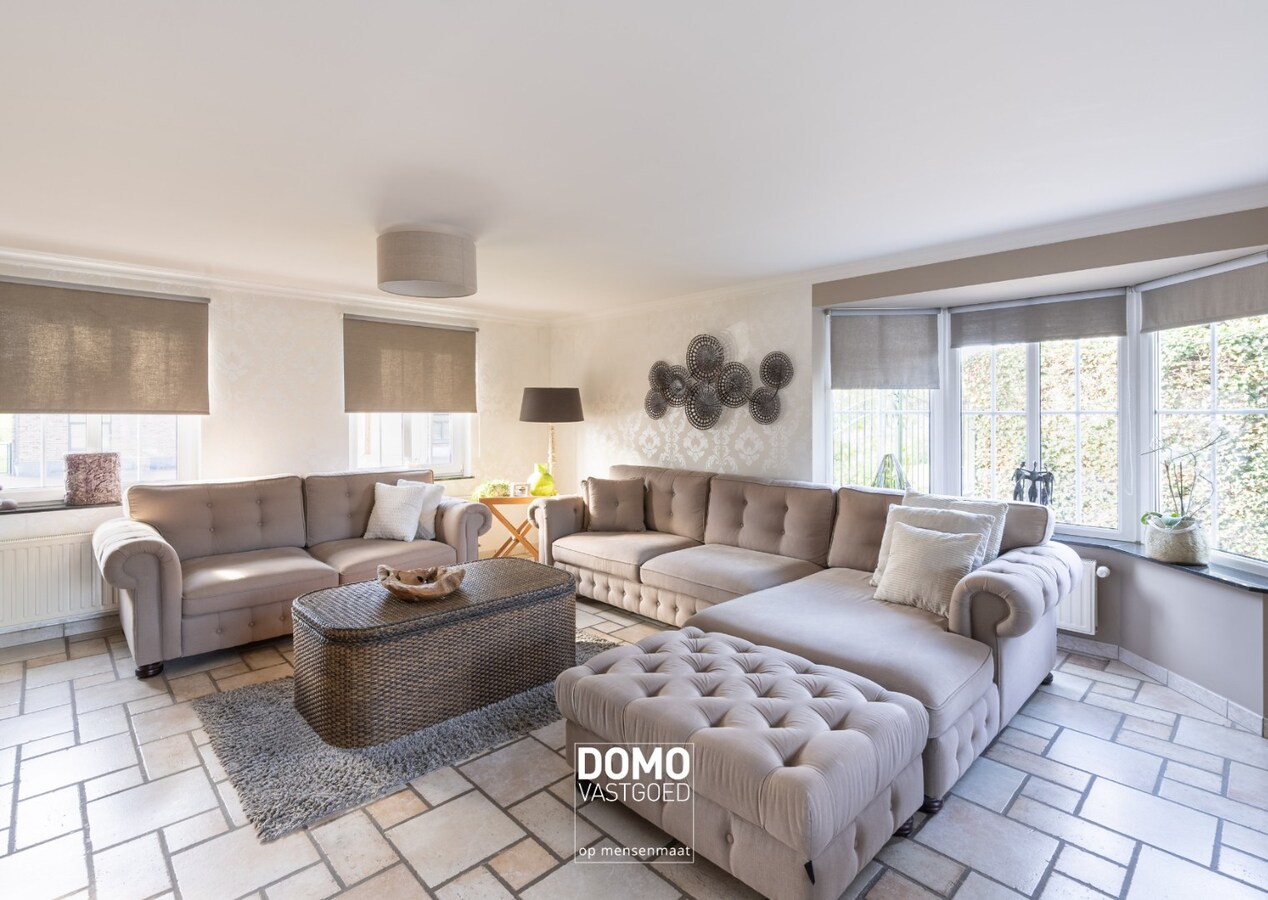 Karaktervolle en ruime gezinswoning in pastorij-/fermettestijl met prachtige tuin en 4 slaapkamers in het groene Kortessem 