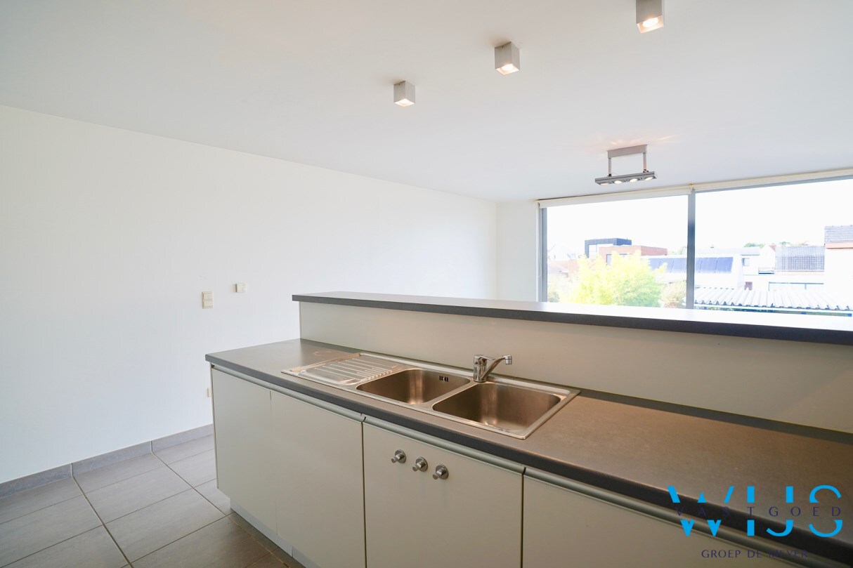 Uniek lichtrijk tweeslaapkamerappartement in hartje ERTVELDE! 