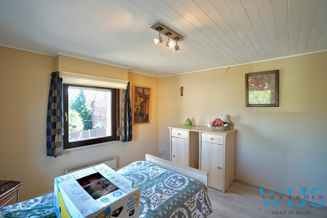 Praktisch en rustig gelegen woning met garage &amp; toffe tuin te Zelzate! 