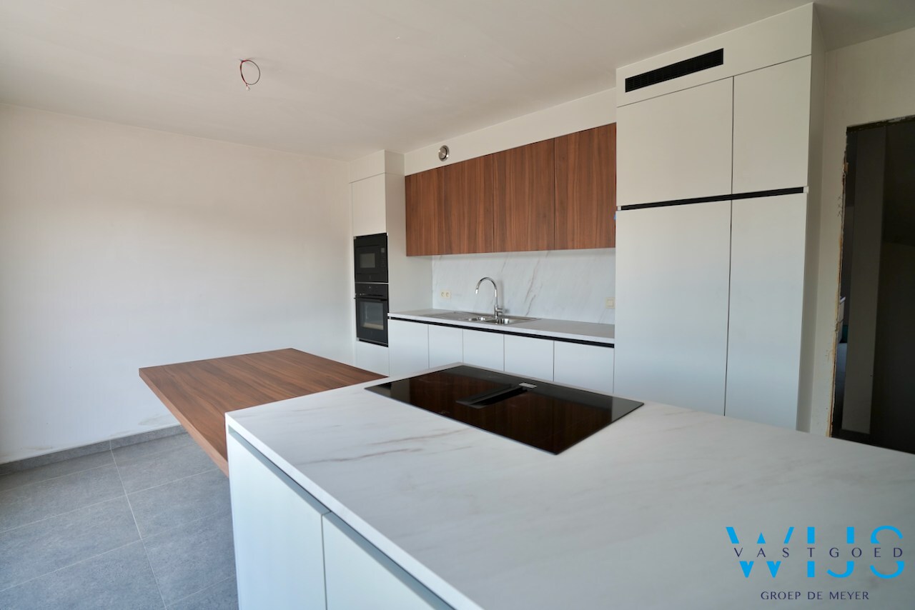 Drieslaapkamer appartement met garage in hartje Ertvelde ! 