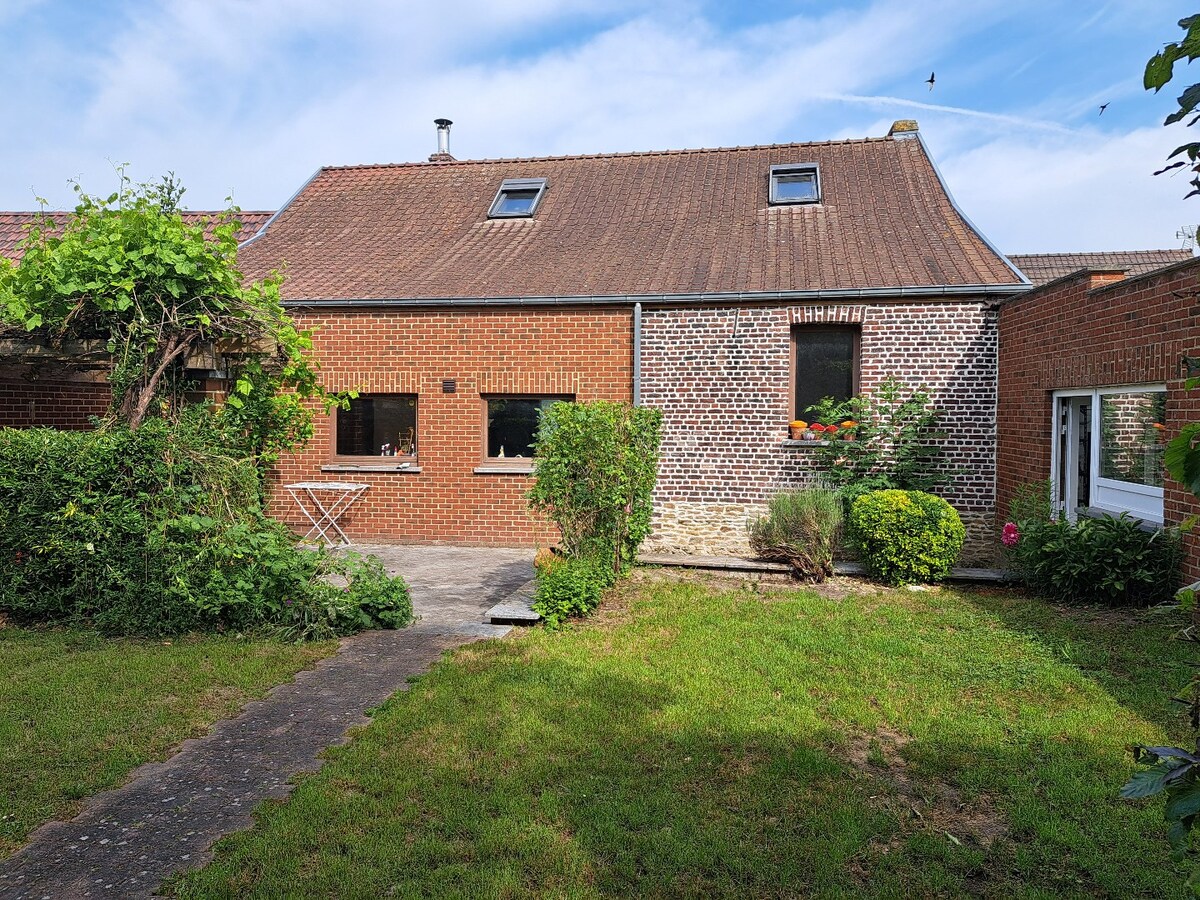 Maison style fermette alliant charme et confort bénéficiant d'un jardin exceptionnel 