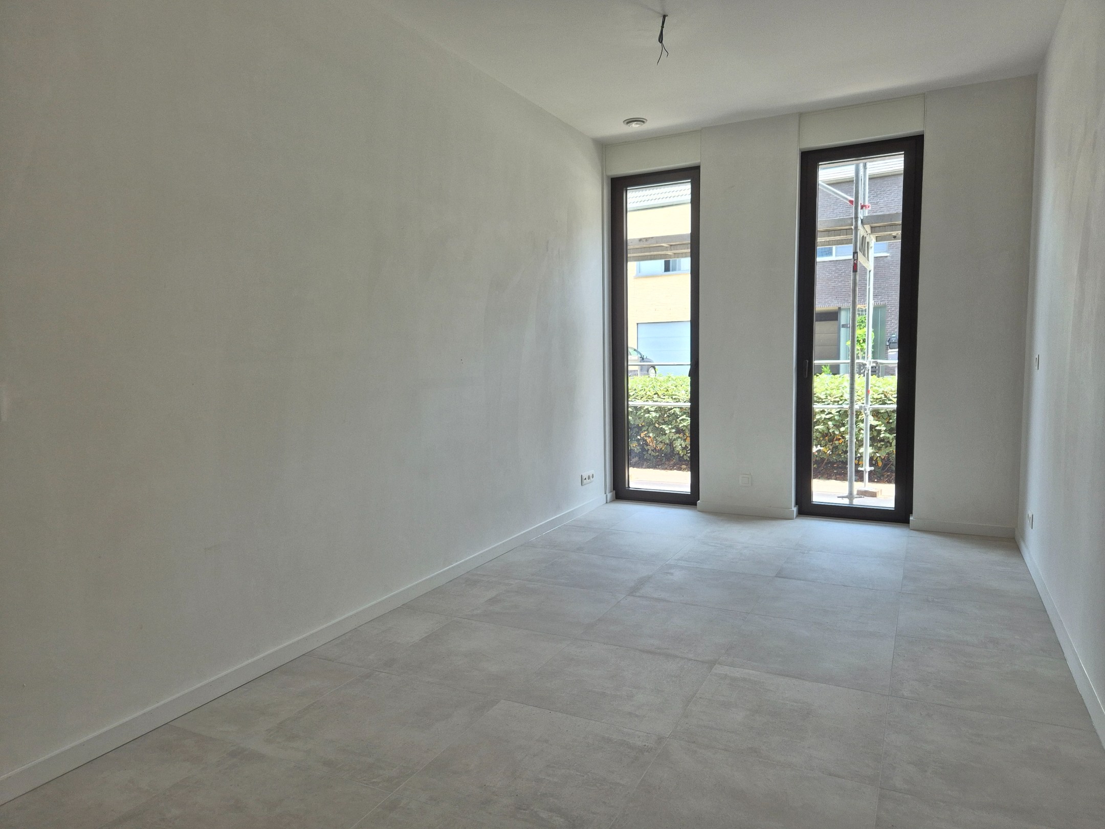 Gelijkvloers appartement met 2 slaapkamers, tuin en terras 