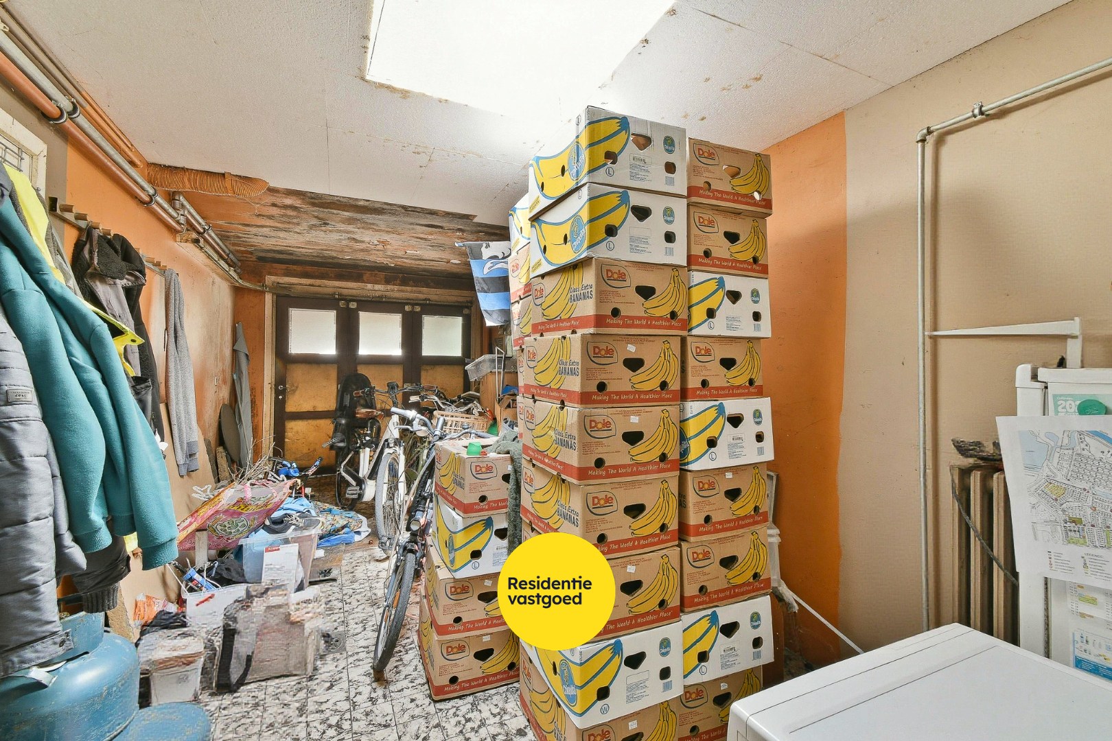 Woning met drie slaapkamers, garage en zonnige tuin 