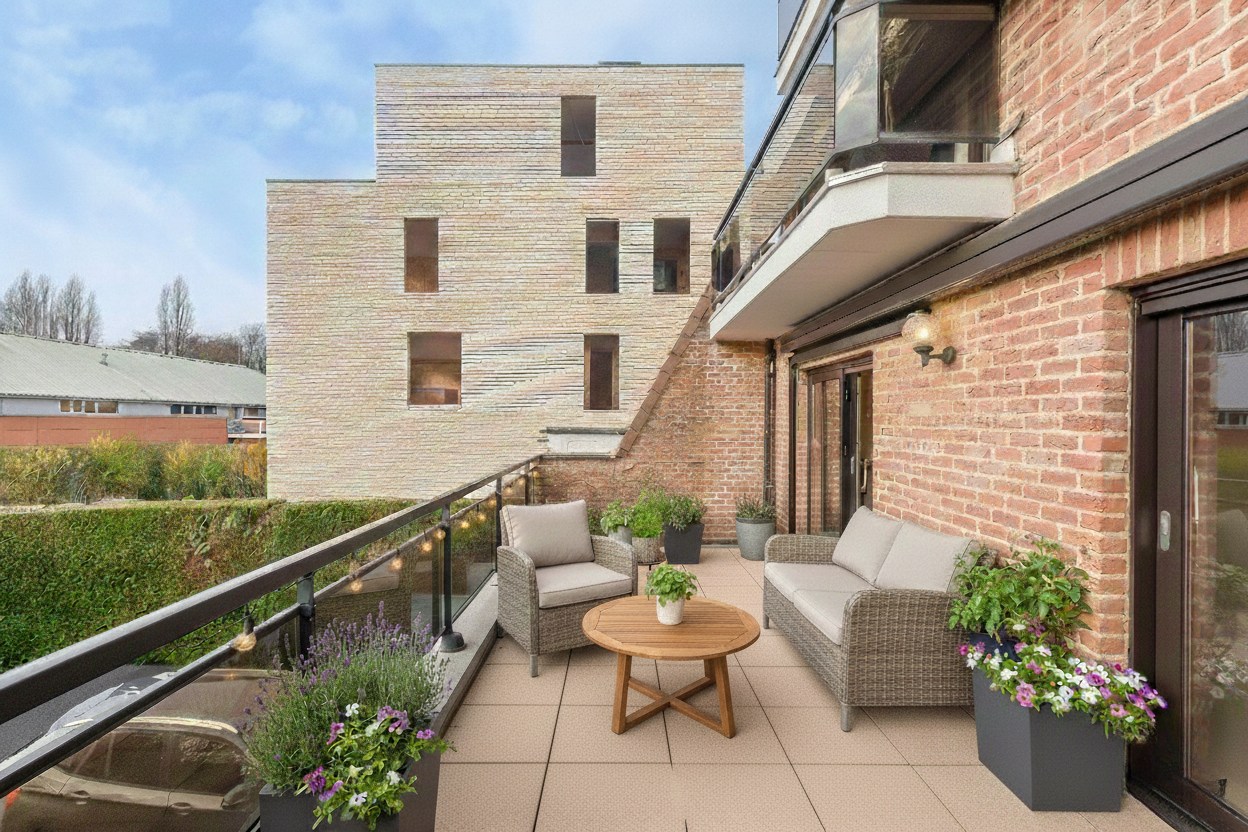 Instapklaar twee-slaapkamerappartement met zonnig terras op sterke locatie in Gentbrugge 