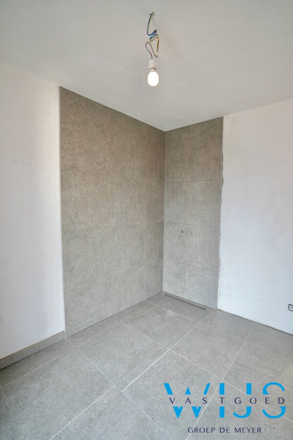 Drieslaapkamer appartement met garage in hartje Ertvelde ! 