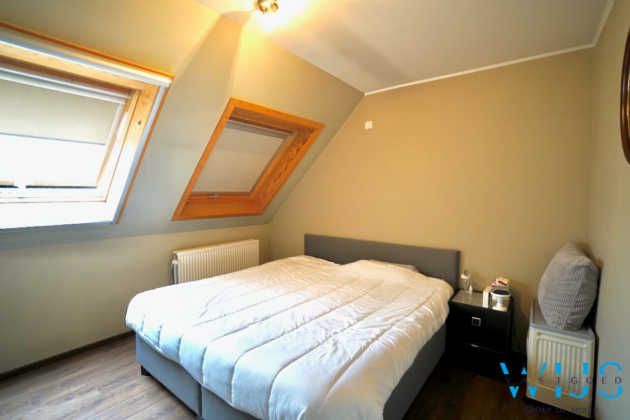 Charmant instapklaar tweeslaapkamer appartement in centrum Ertvelde! 