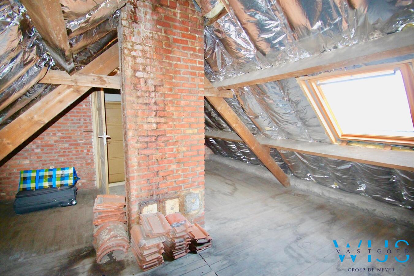 Praktische instapklare rijwoning gelegen in een rustige straat te Rieme! 