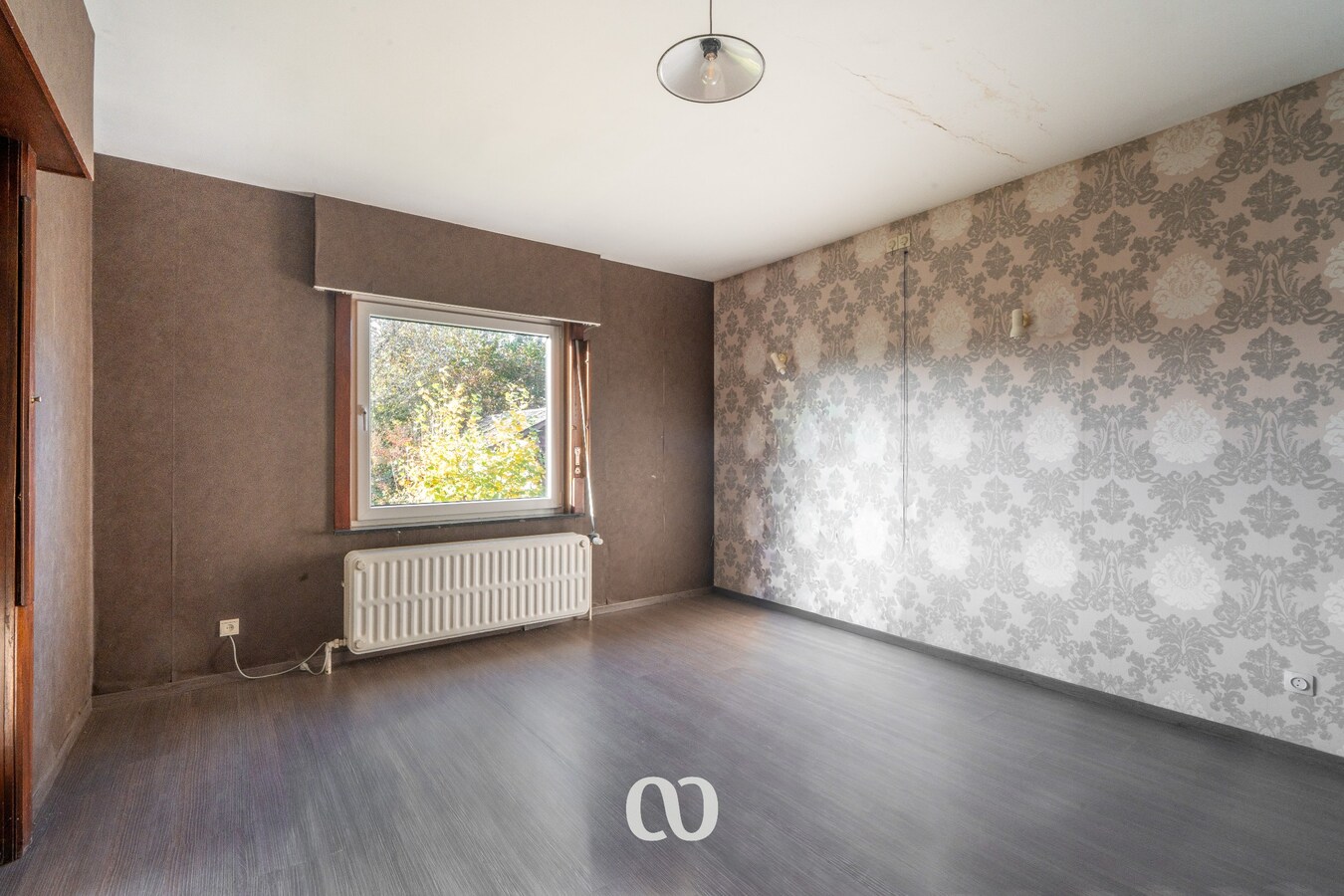 Te renoveren gezinswoning met grote tuin en agrarisch uitzicht 