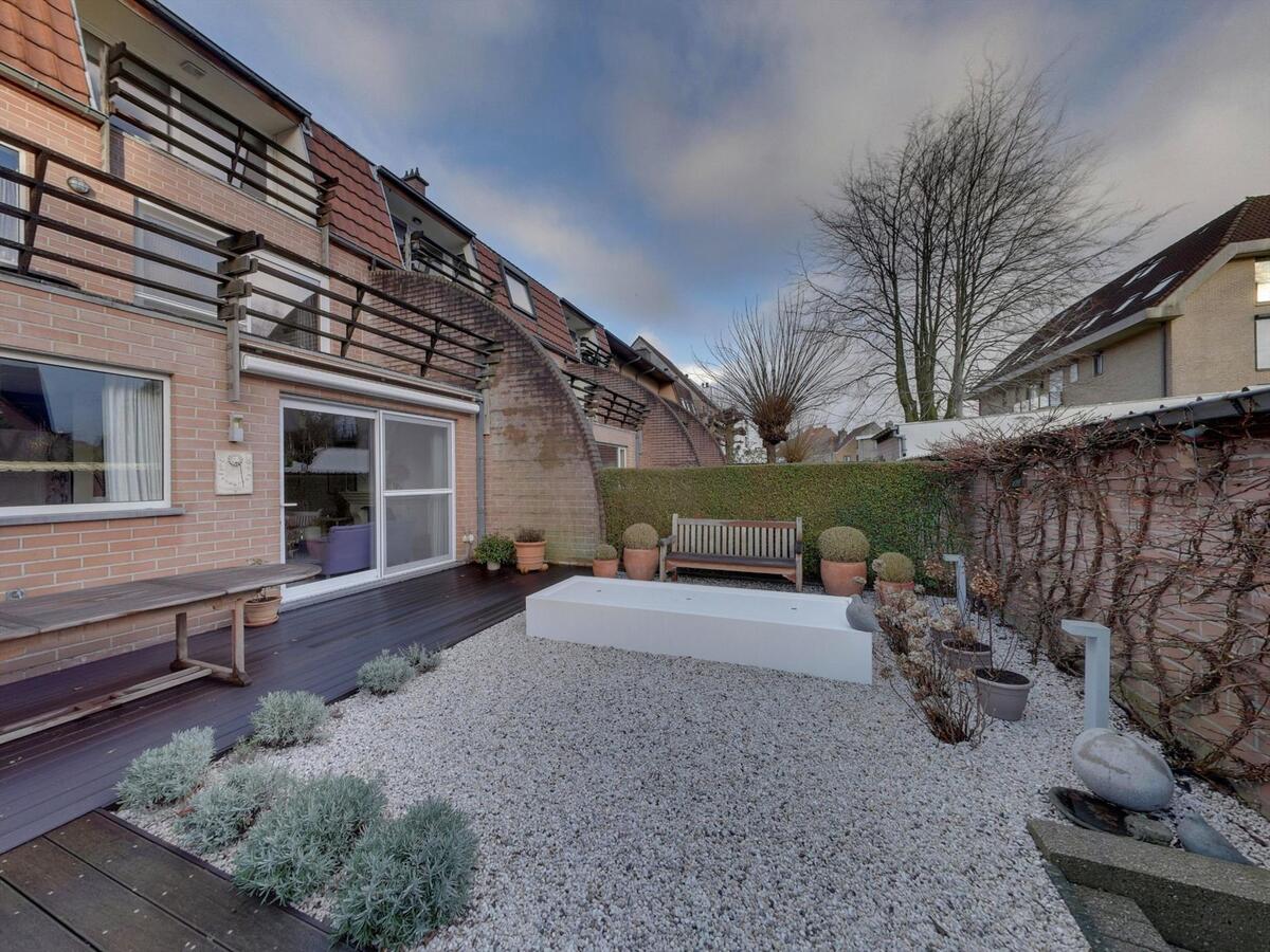 Gelijkvloers appartement met zuidgerichte tuin 