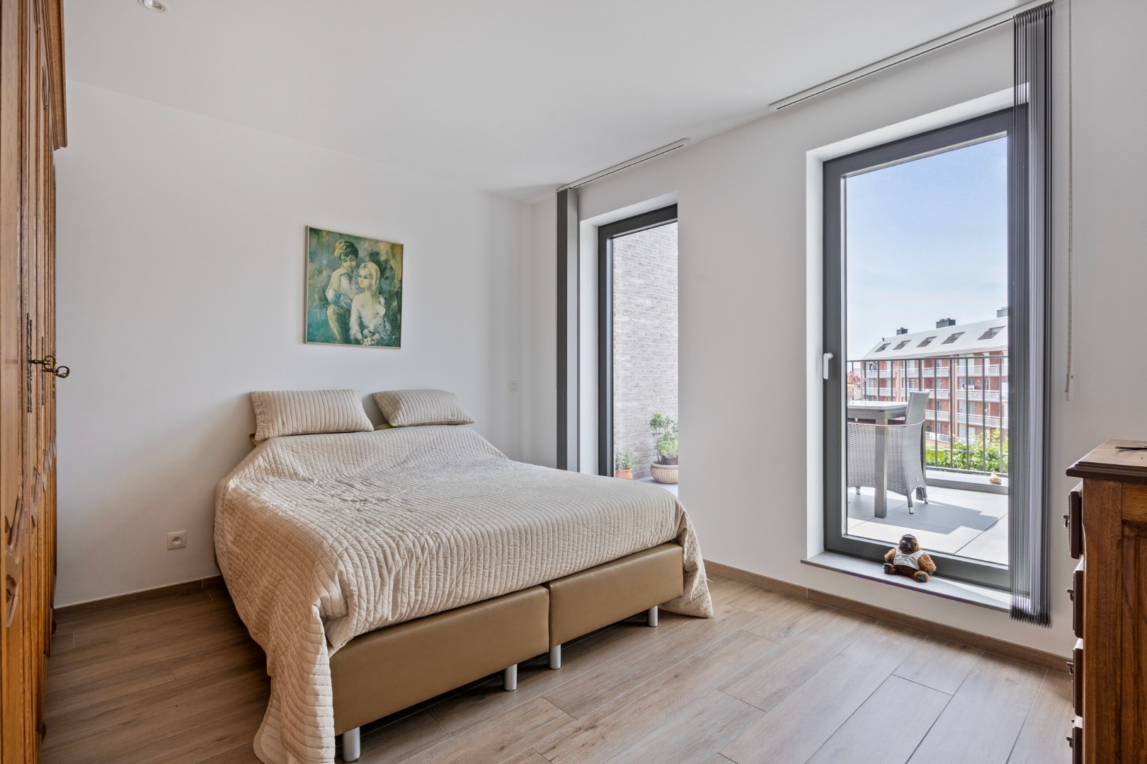 Slaapkamer 1 met toegang terras achterzijde