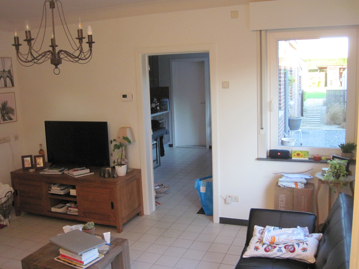 Degelijke én gezellige woning. Met tuin en met garage. 