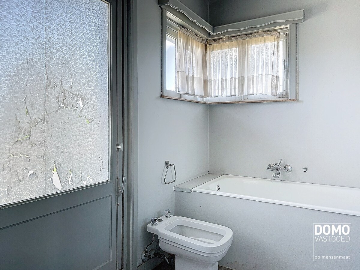 Te renoveren karaktervolle open bebouwing met tuin - mogelijkheid tot creëren extra half open bebouwing 