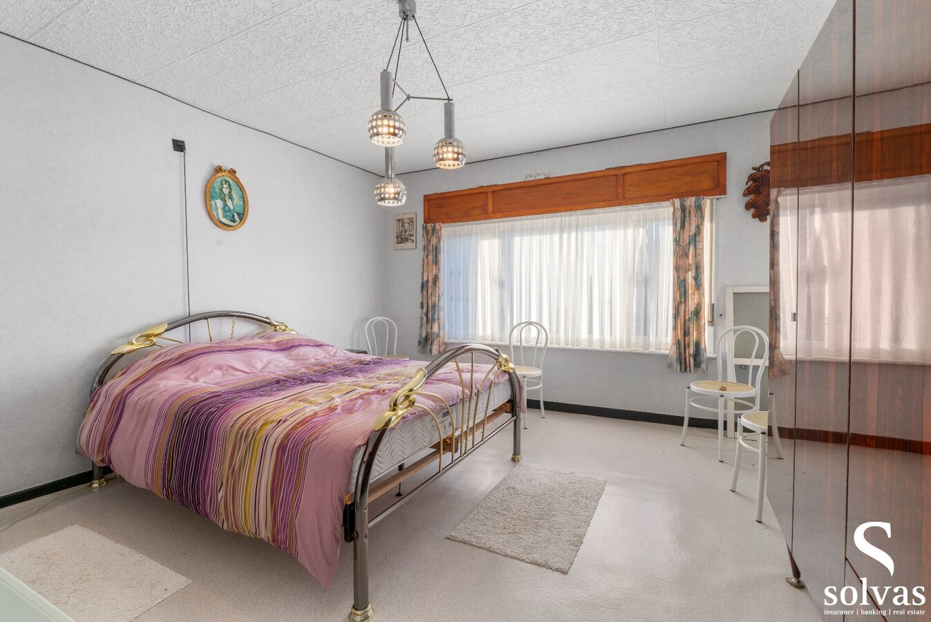 Ruime te renoveren woning met garage, tuin en 4 slaapkamers in Lembeke, bouwjaar 1960, energielabel G 