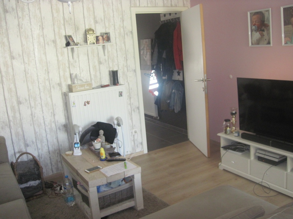 Ruim gelijkvloers appartement met terras en tuintje. Incl. afz. garage ! 