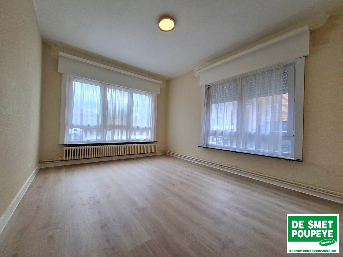 Gelijkvloersappartement met terras en garage 