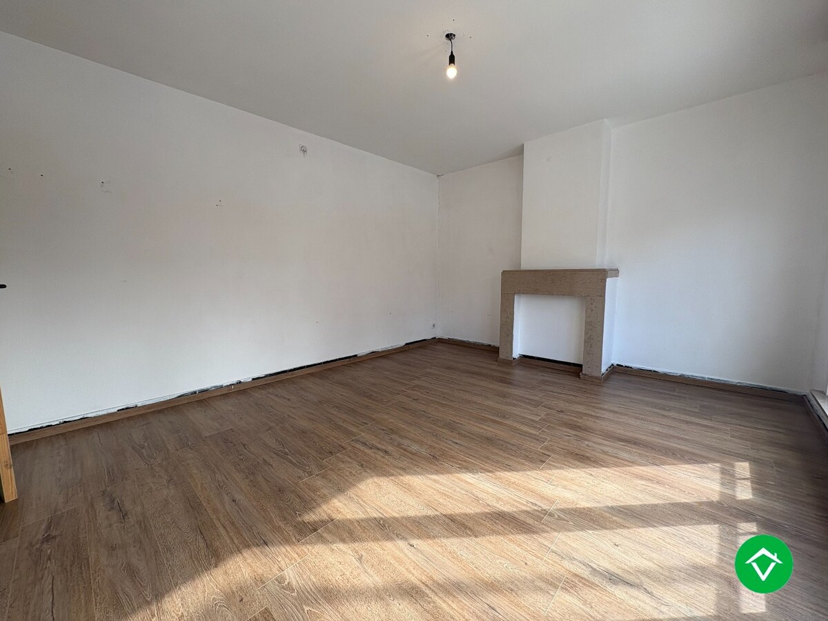 Te koop: Uniek gebouw met 2 appartementen, garage en ruime tuin – hartje Nieuwpoort-Stad 