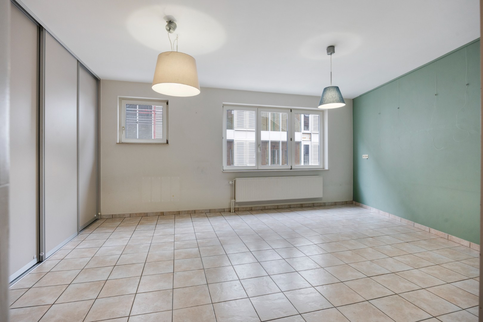 Appartement met 3 slaapkamers, autostaanplaats en terras in het centrum van Lubbeek – EPC 220 kWh/m² - bewoonbare opp. 182 m² 