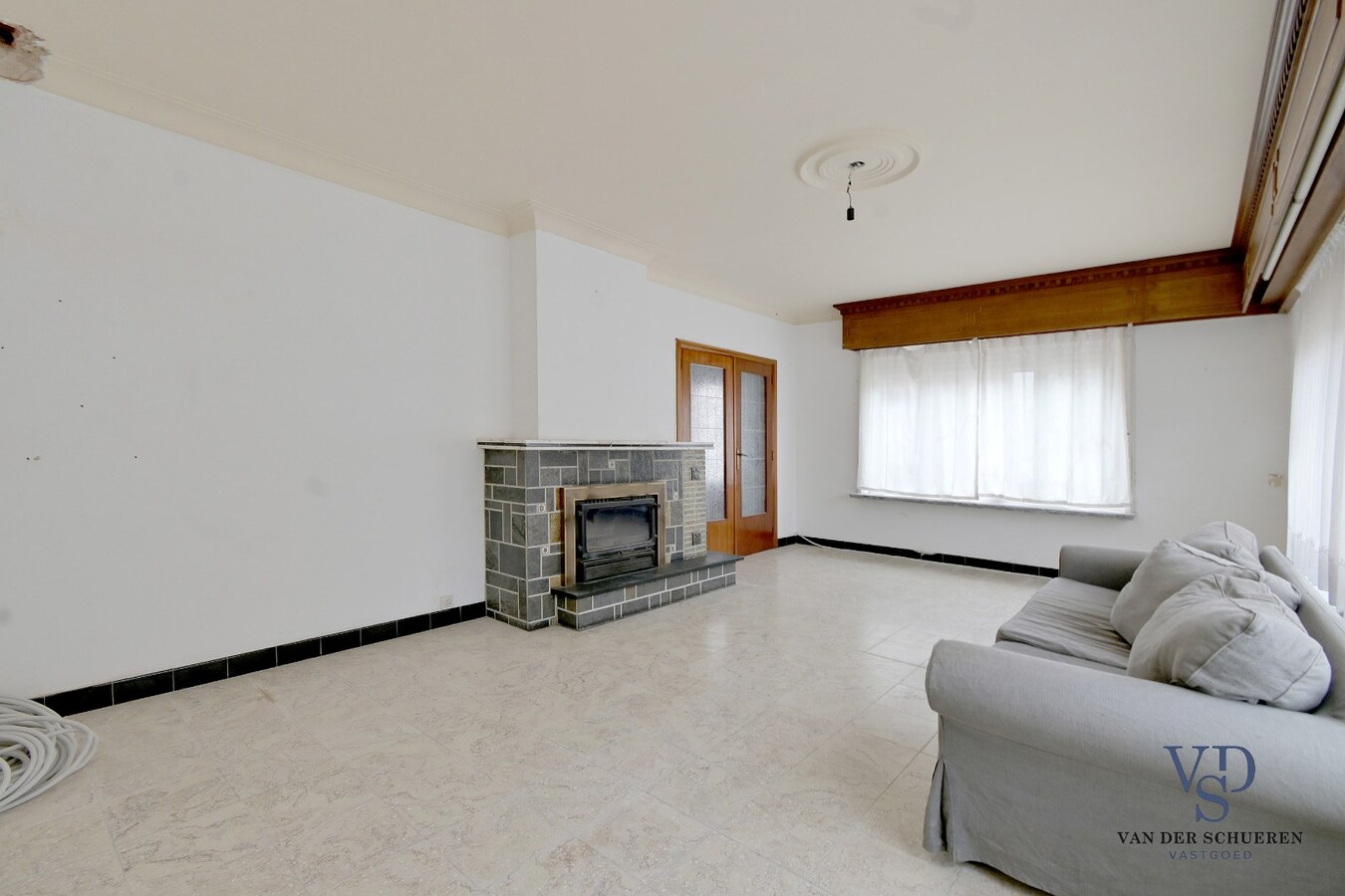 Degelijke, goed gelegen woning. 