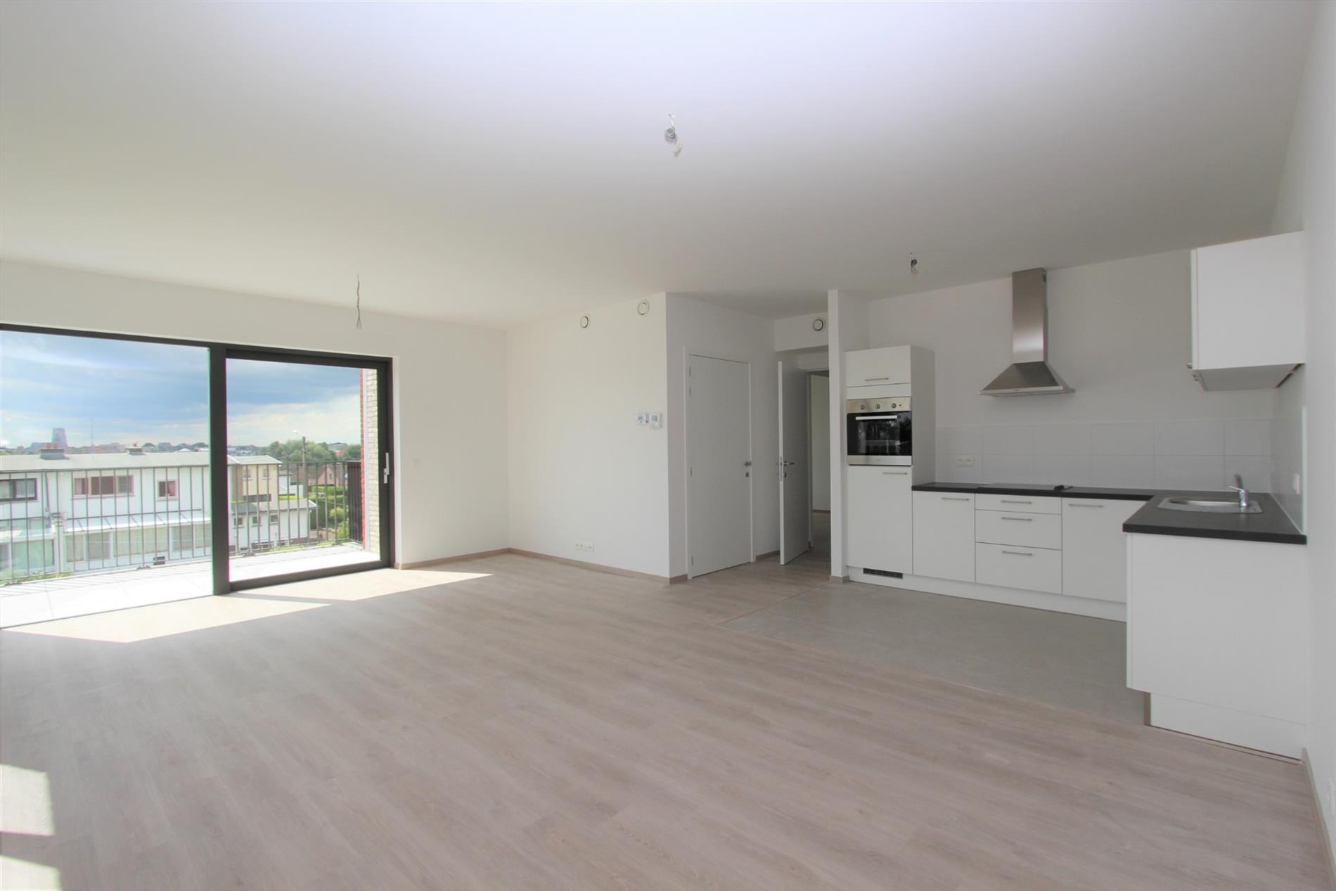 woonkamer met open keuken