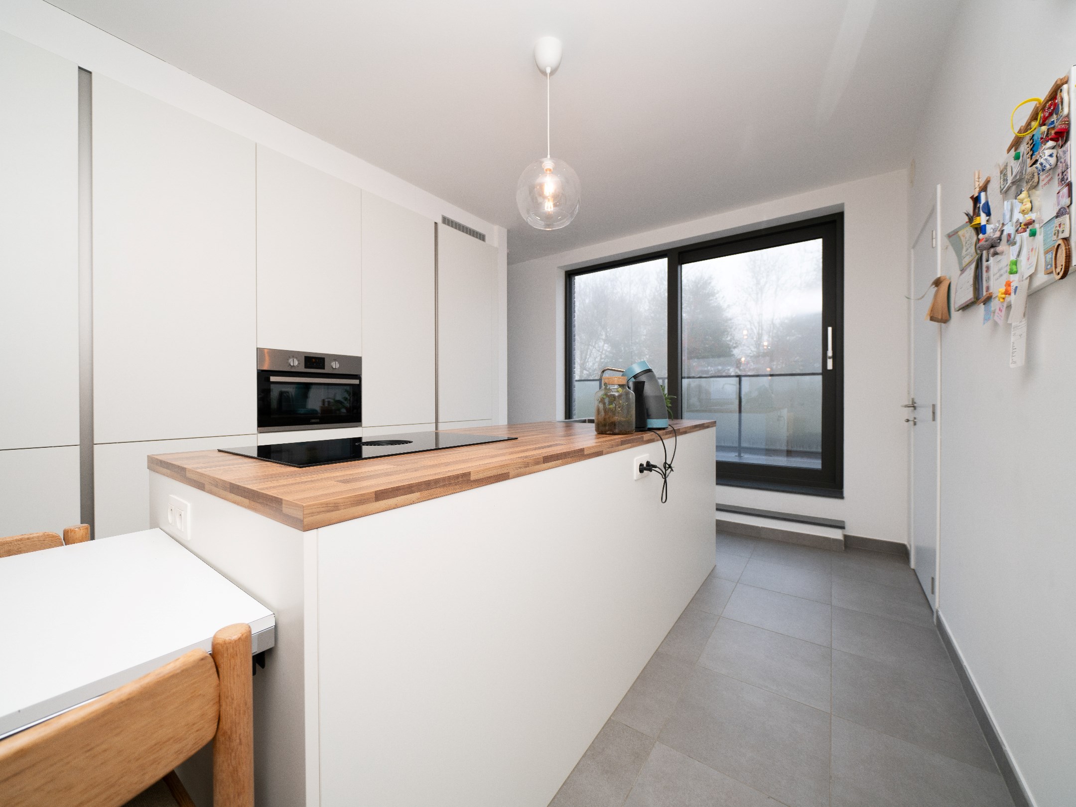 Nieuwbouwappartement met 3 terrassen, staanplaats en kelder 