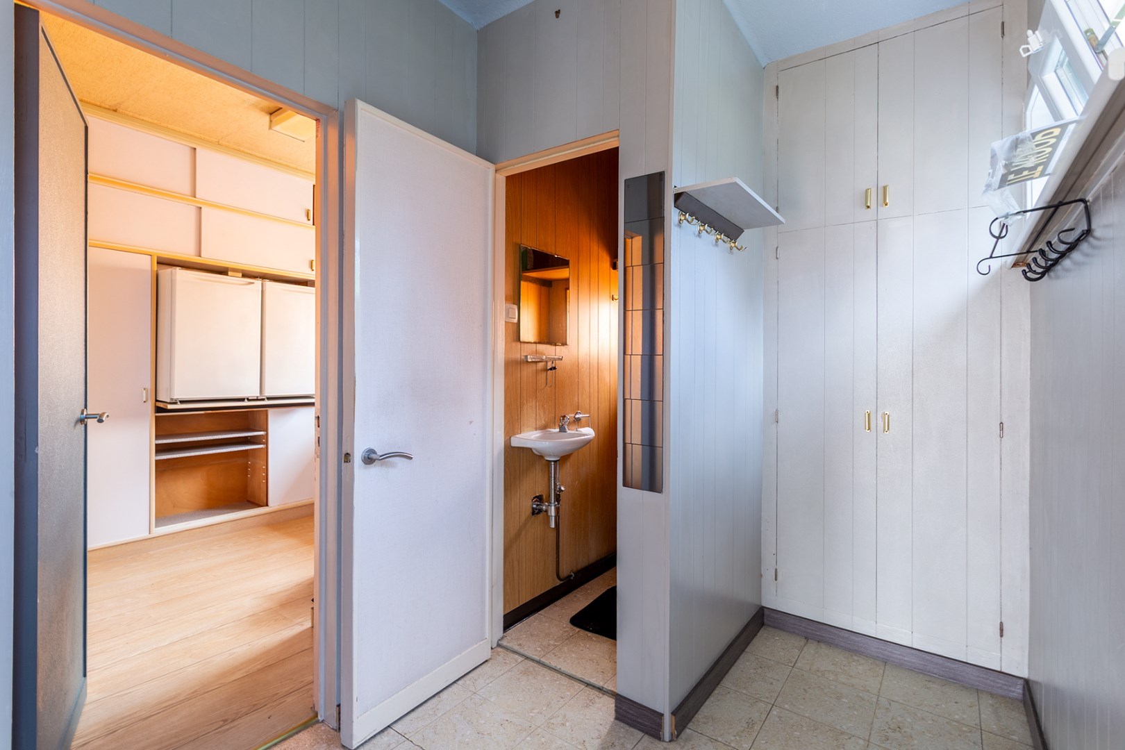 Halfopen gezinswoning met grote tuin en garage 