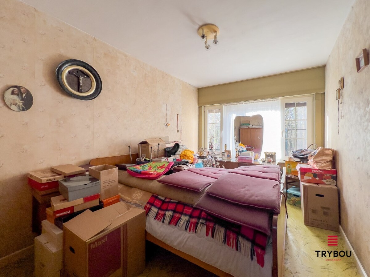 Ruime gezinswoning met 4 slaapkamers, garage en tuin 