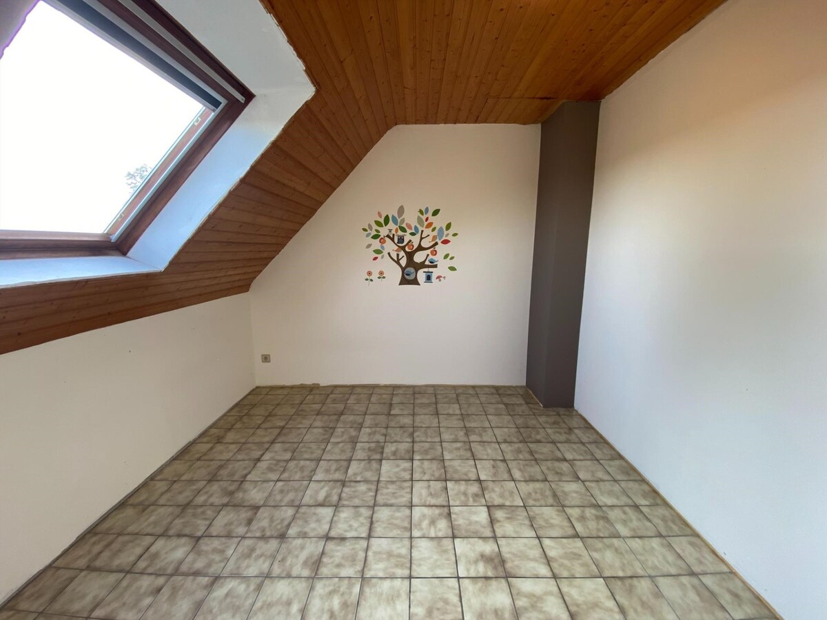 Rustig gelegen woning met garage en zonnige tuin te Poperinge 