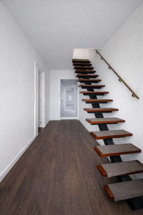 Centraal gelegen woning met drie slaapkamers, tuin én inpandige garage te koop in Sint-Niklaas! 