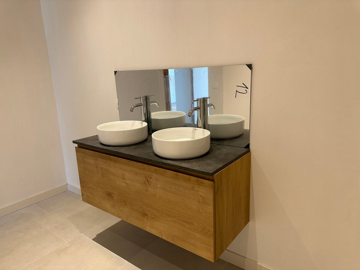 Nieuw gelijkvloers appartement met terras en tuintje 