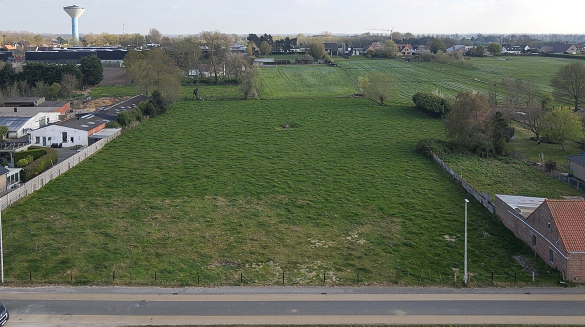 Bouwgrond voor halfopen bebouwing op  476 m² in Oudenburg 