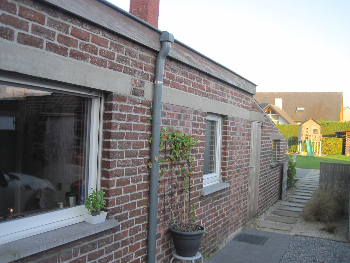 Degelijke én gezellige woning. Met tuin en met garage. 