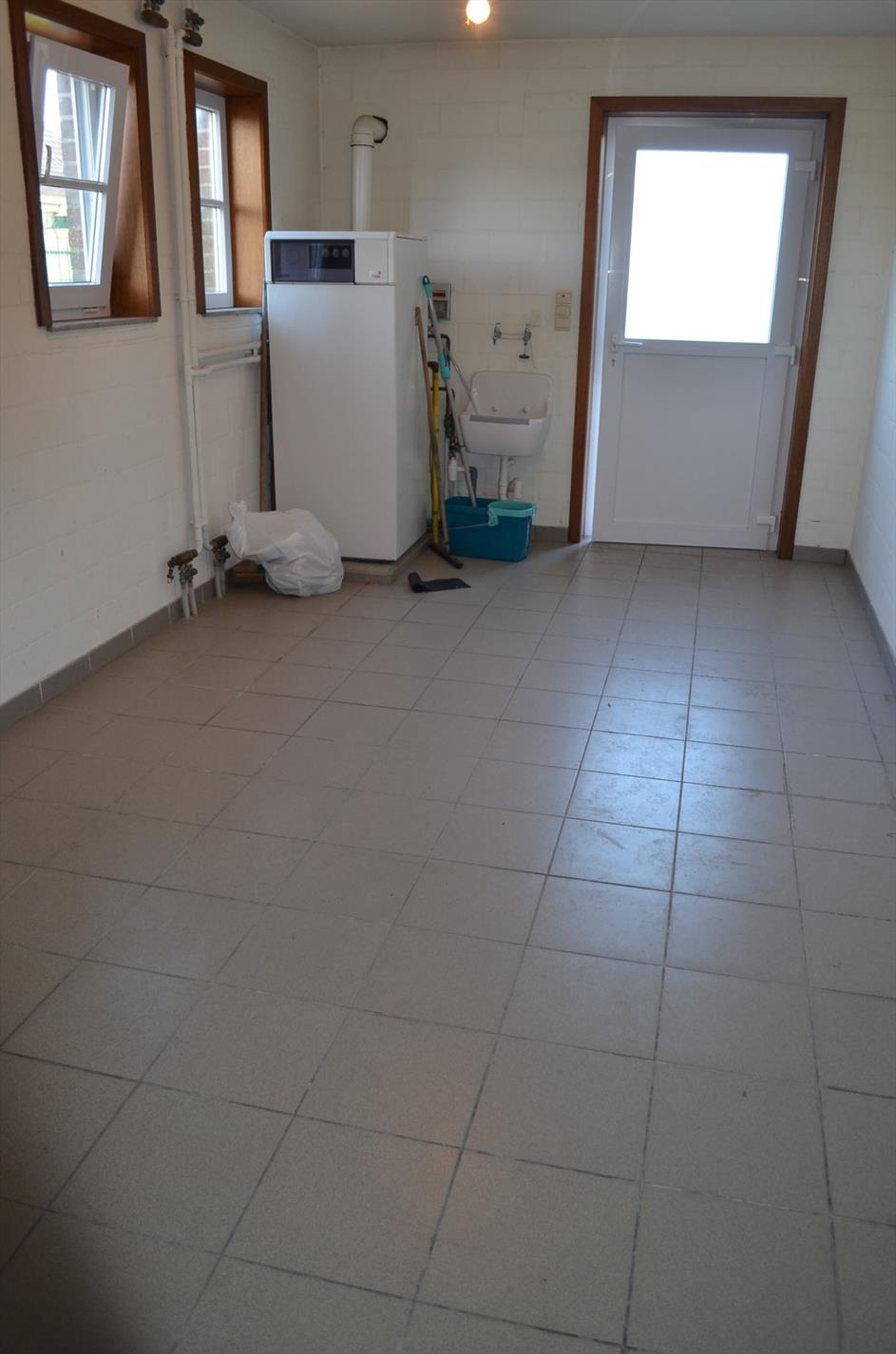 Gezinswoning met 2 slpks (mogelijkheid 3), garage en tuin nabij centrum Maldegem 