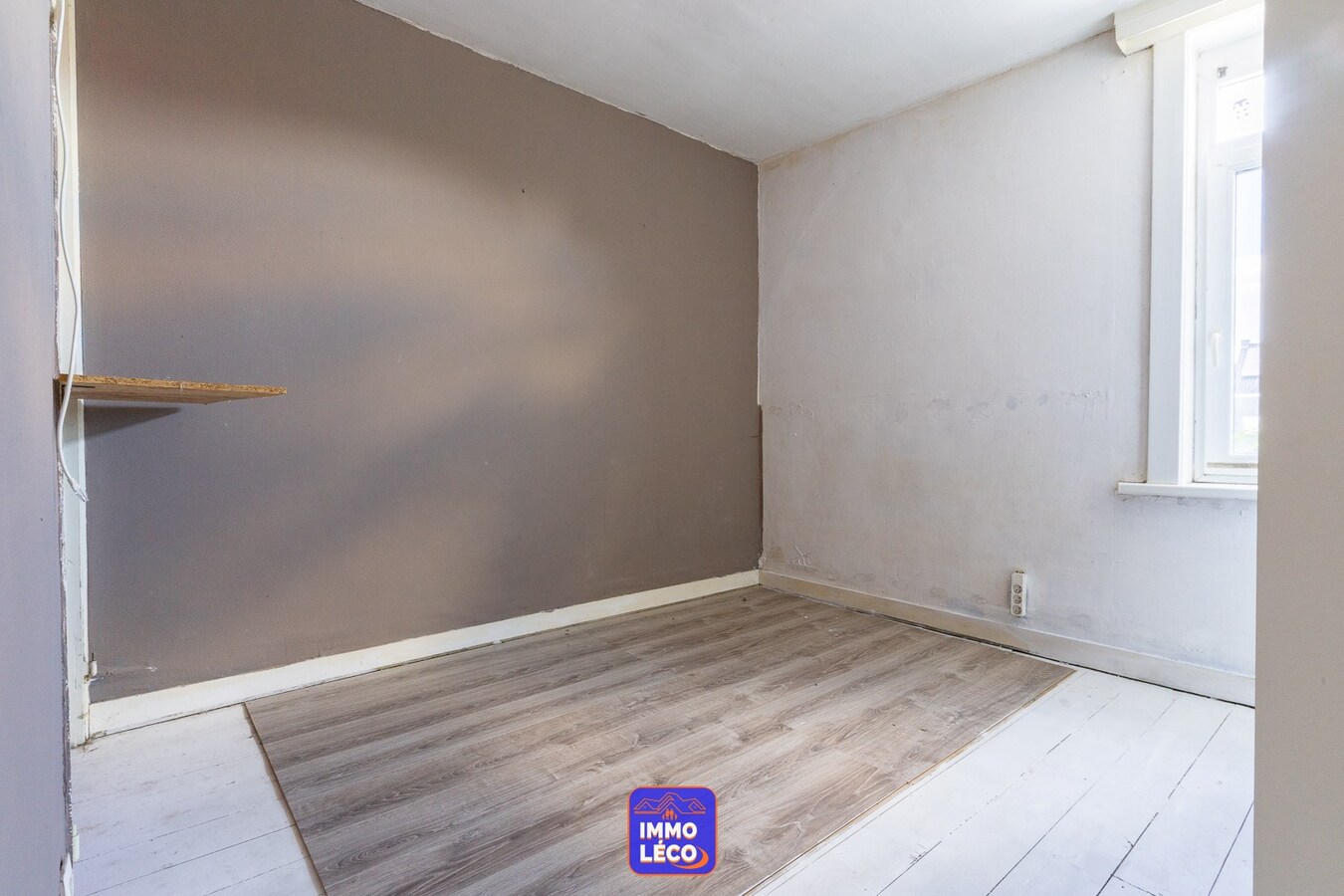 Maison offrant de beaux volumes avec jardin, plein centre-ville ! 