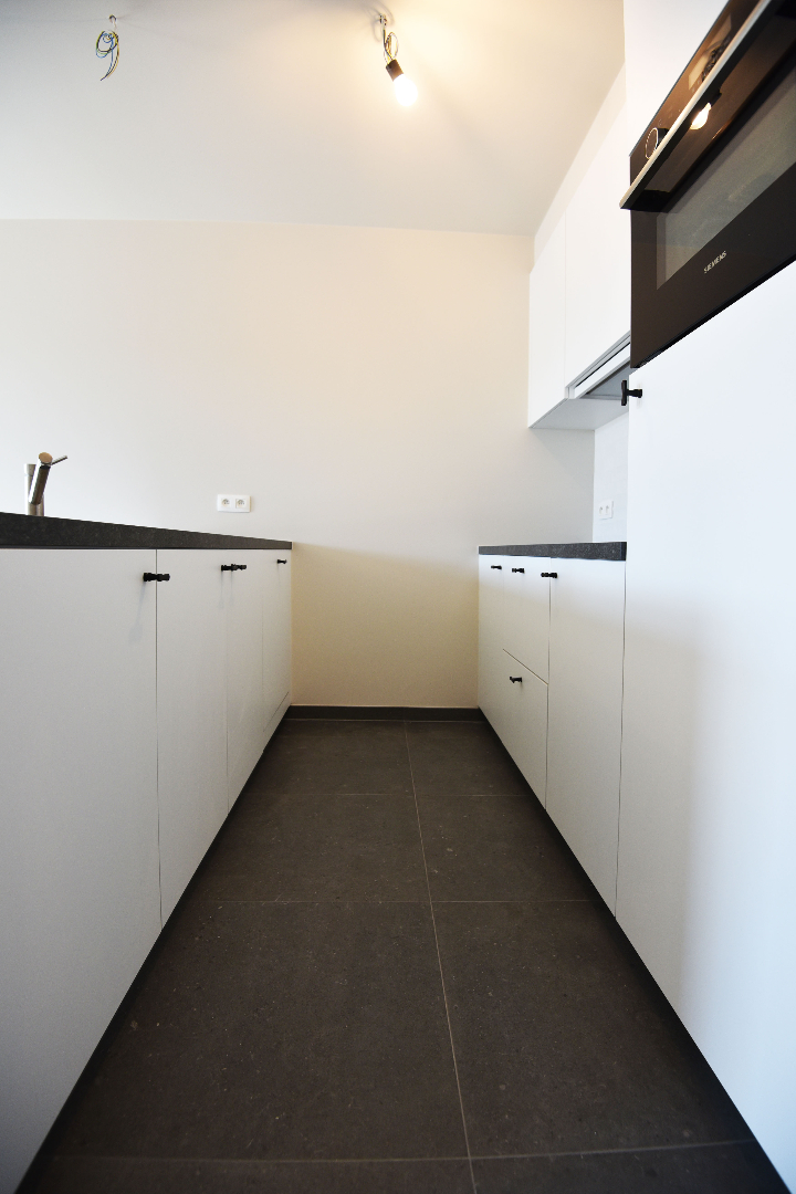 Nieuwbouwappartement, 2 slpks, autostaanplaats en terras te MALDEGEM centrum. 