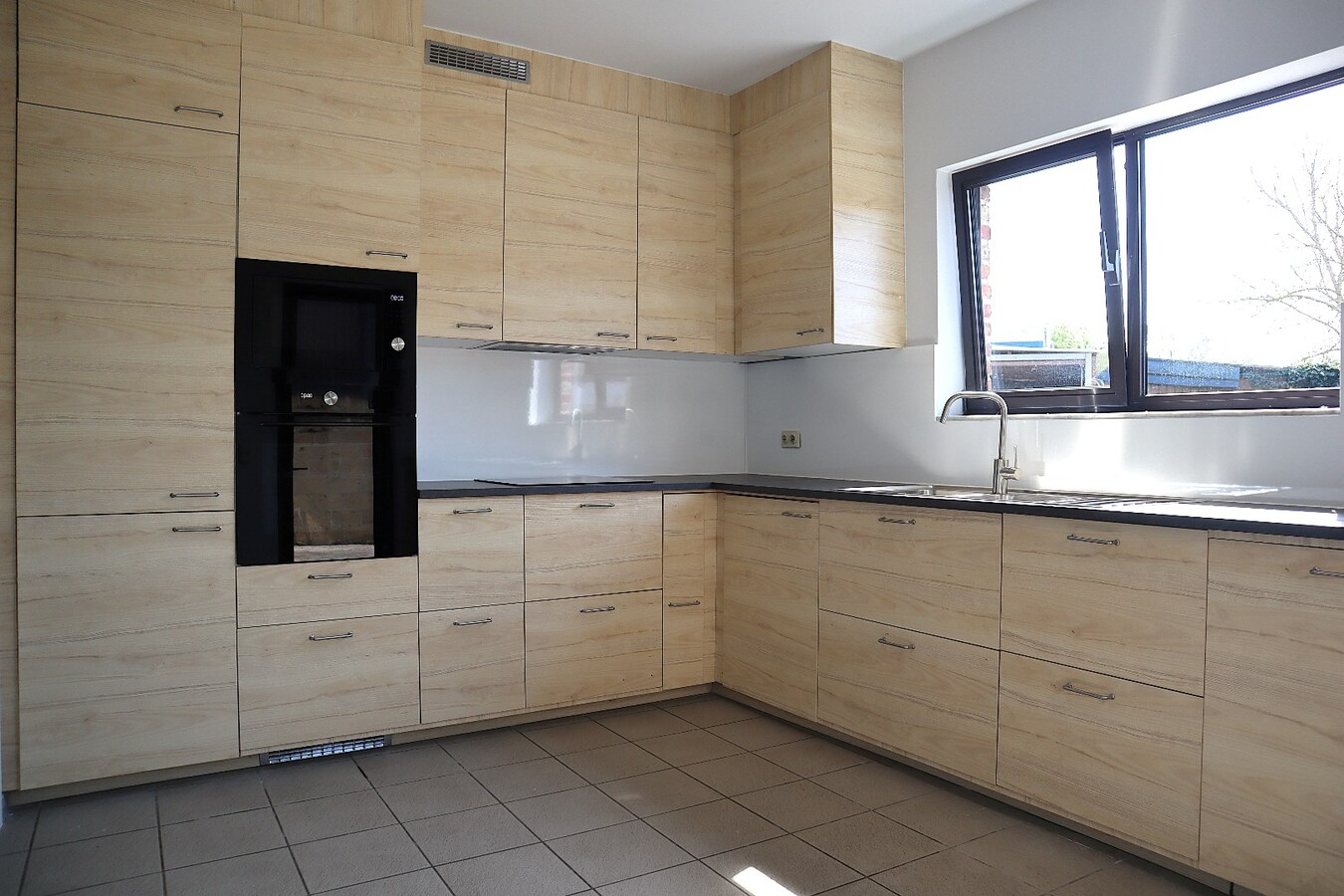 Rijwoning met 4 slaapkamers en tuin te Bierbeek 