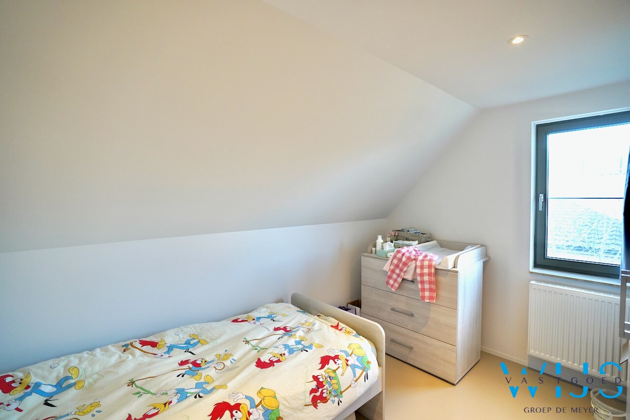 Tof woonhuis in een gekende woonwijk te Evergem 