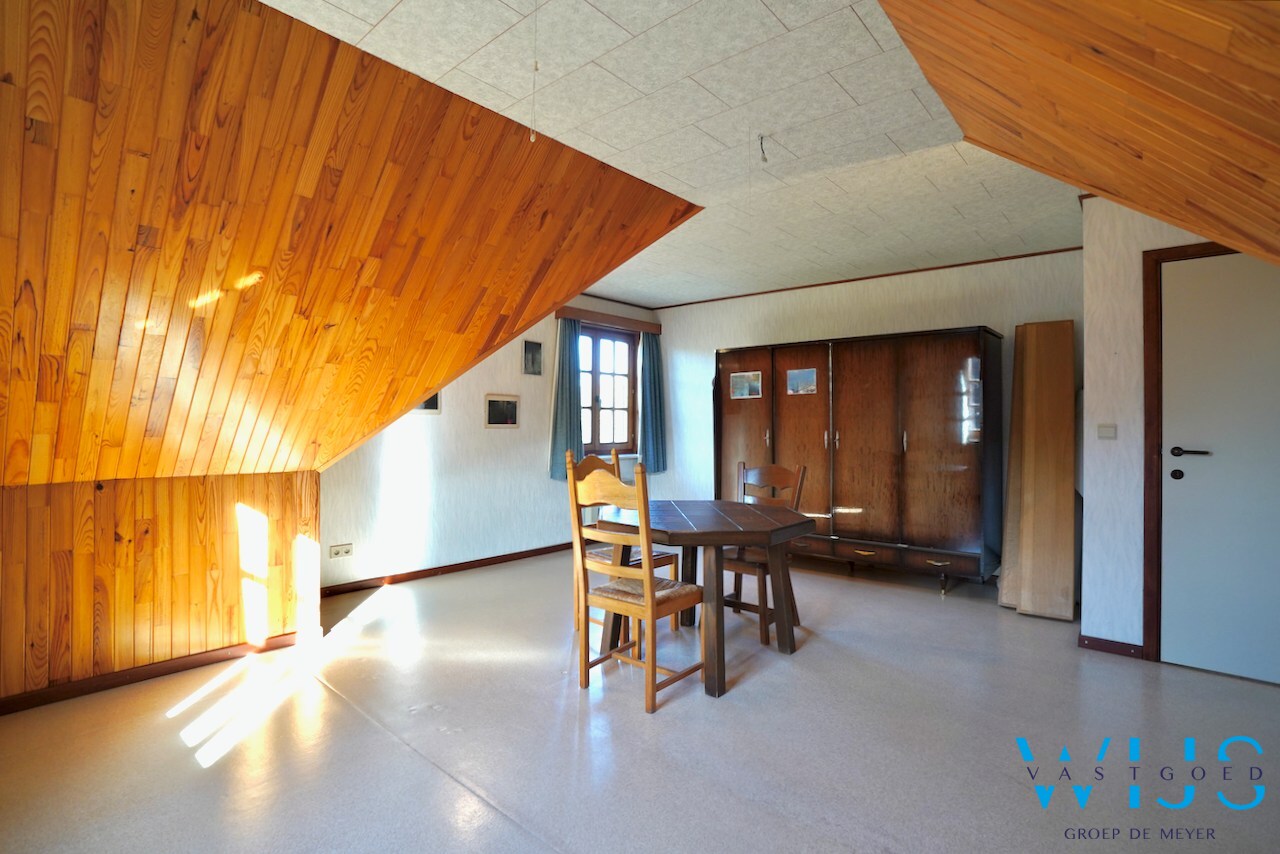 Fantastische open bebouwing met dubbele garage in gegeerde woonwijk te Evergem 