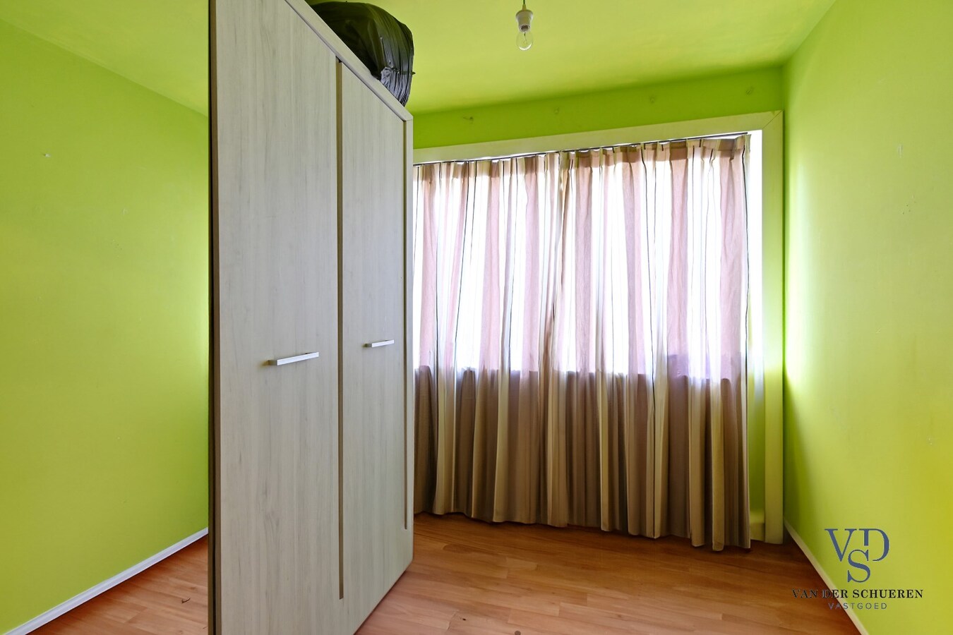 Woning met tuin - te renoveren. 