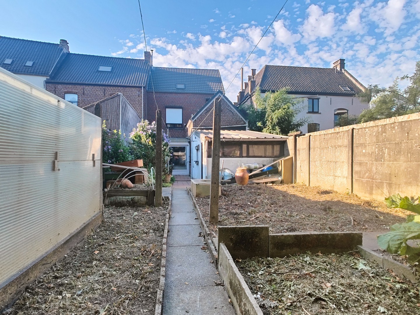 Unieke woning met achterliggende tuin  in het centrum van Pittem 