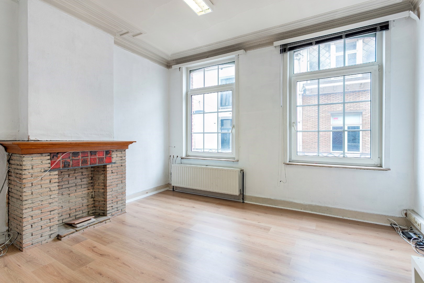 Handelshuis én appartement centrum Halle 