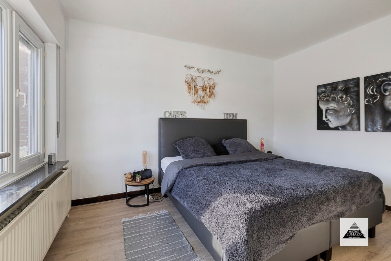 Gelijkvloers appartement met tuintje en parking 