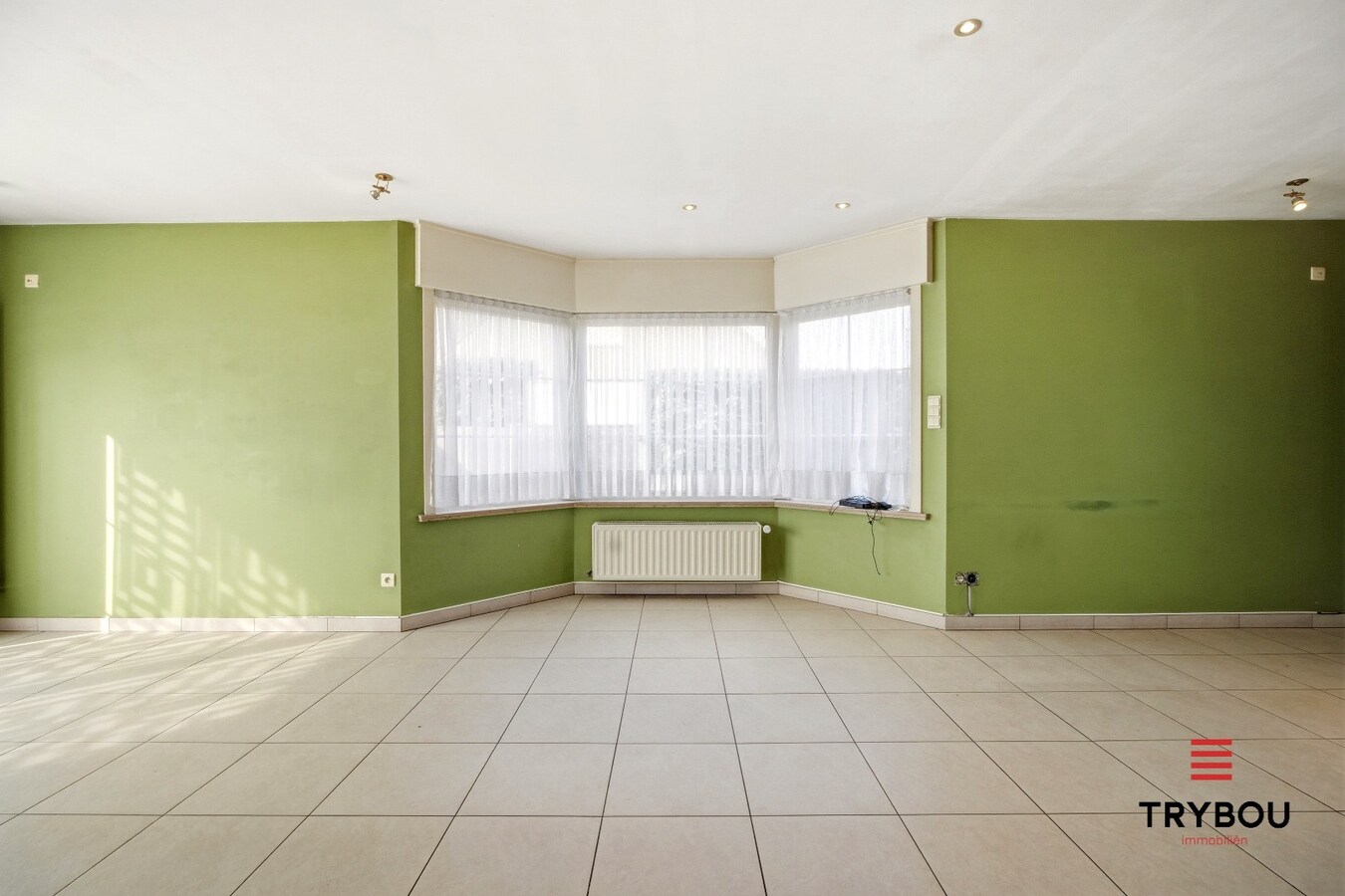 Ruime halfopen woning met 5 slaapkamers te koop in Werken met garage en ruime tuin! 