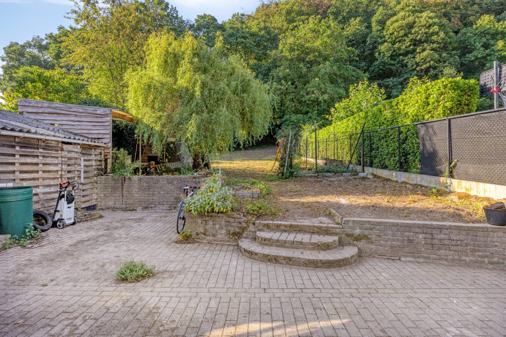 Halfopen bebouwing met 5 ruime slaapkamers, 2 badkamers, garage en tuin in Holsbeek – bewoonbare oppervlakte 214m² 