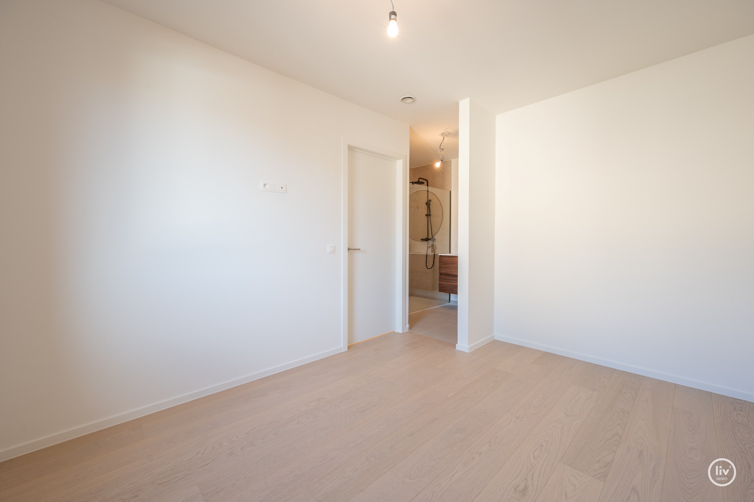 Centraal gelegen nieuwbouw-appartement in de residentie Maurice (met mogelijkheid tot aankoop van een inpandige autostaanplaats). 