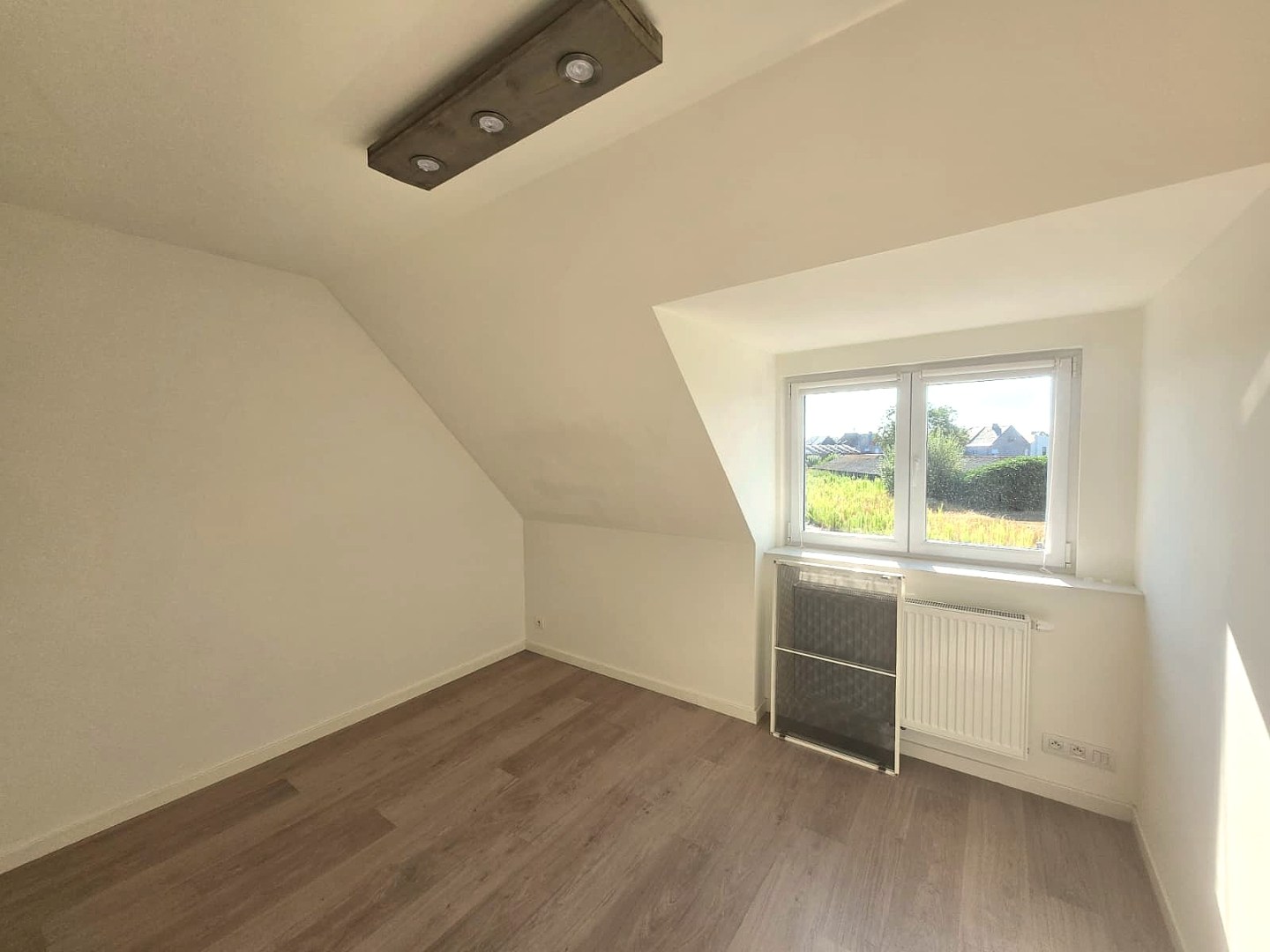 Energiezuinige halfopen woning met tuin en carport te Zulte 