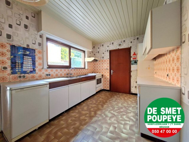 Ruime rijwoning met garage en tuin 