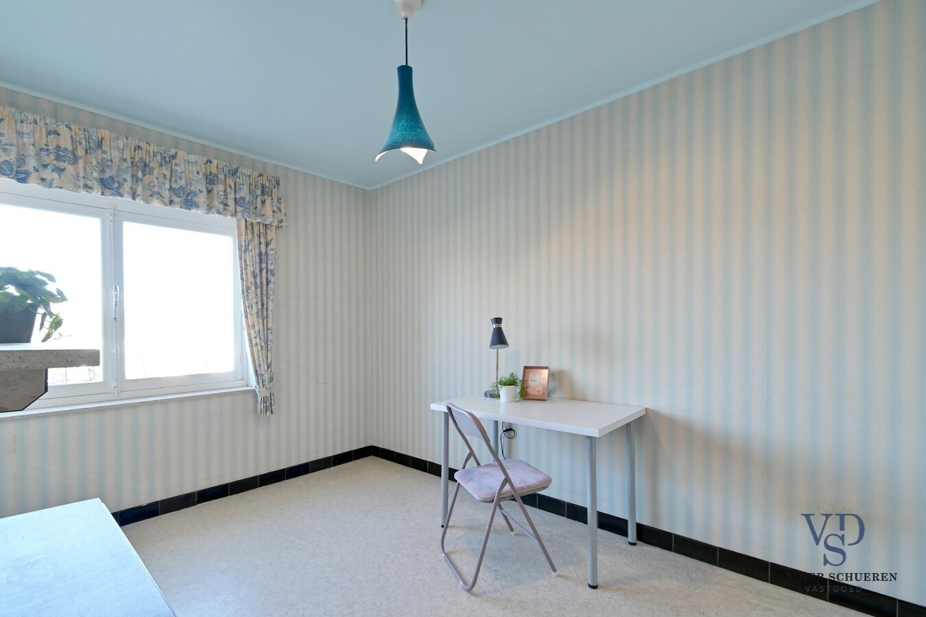 Degelijke, ruime woning (op te frissen). 