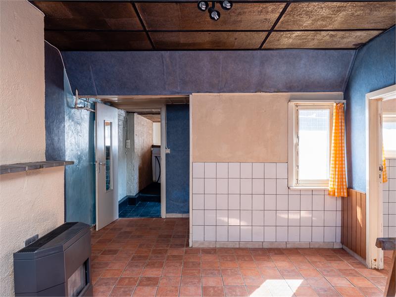 Charmante halfopen woning te Watervliet met potentieel. 